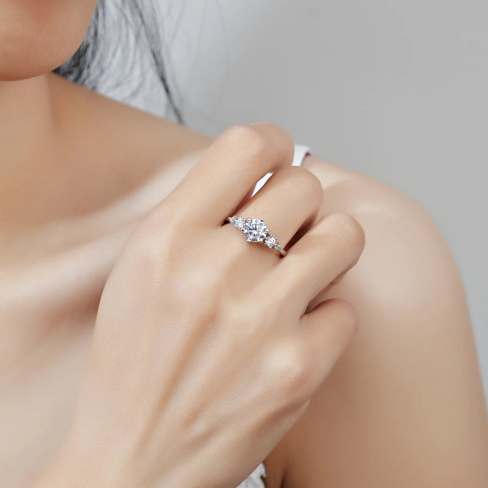 1CT D Color Moissanite ring with zircon accent stones.